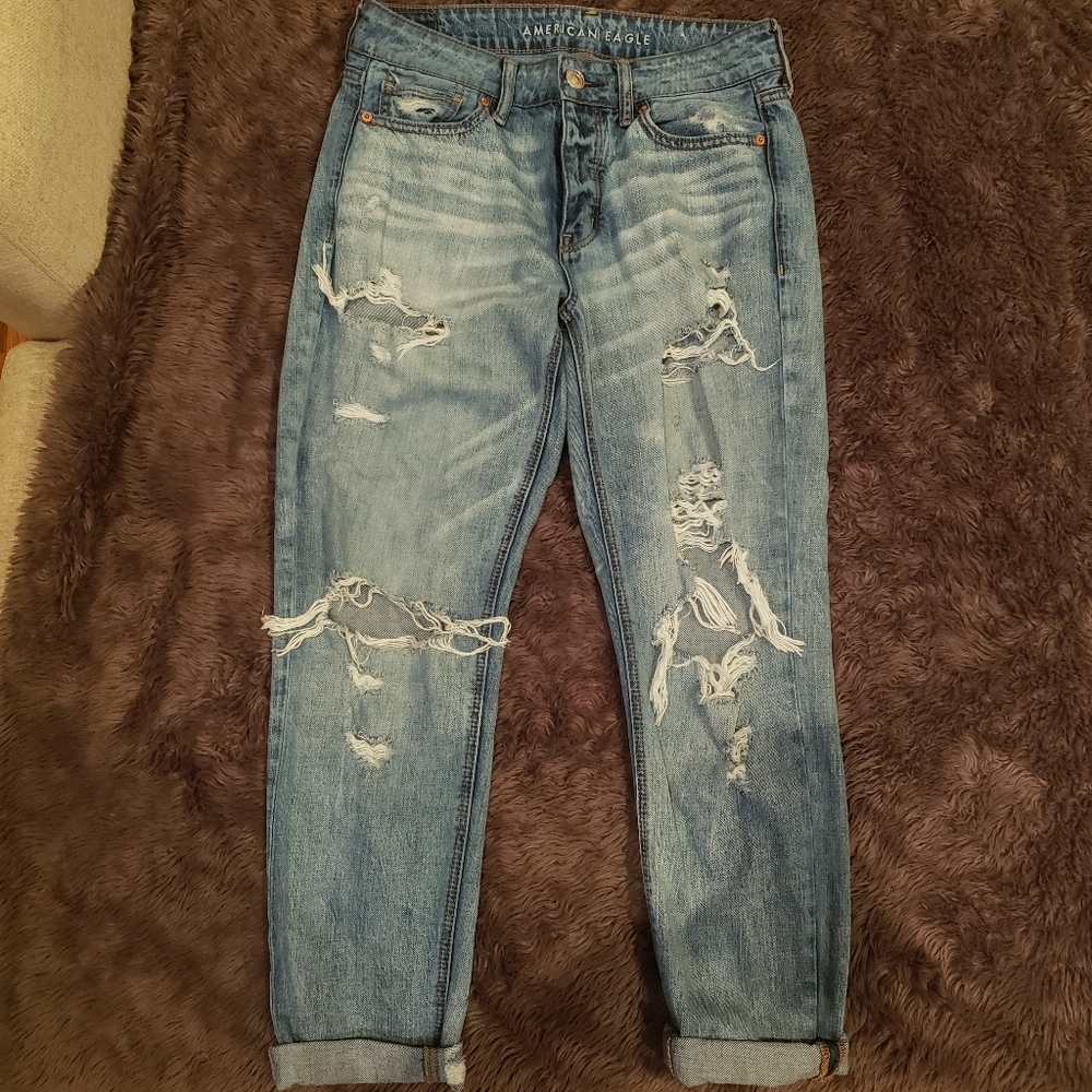 American Eagle heavily distressed Tomgirl jeans